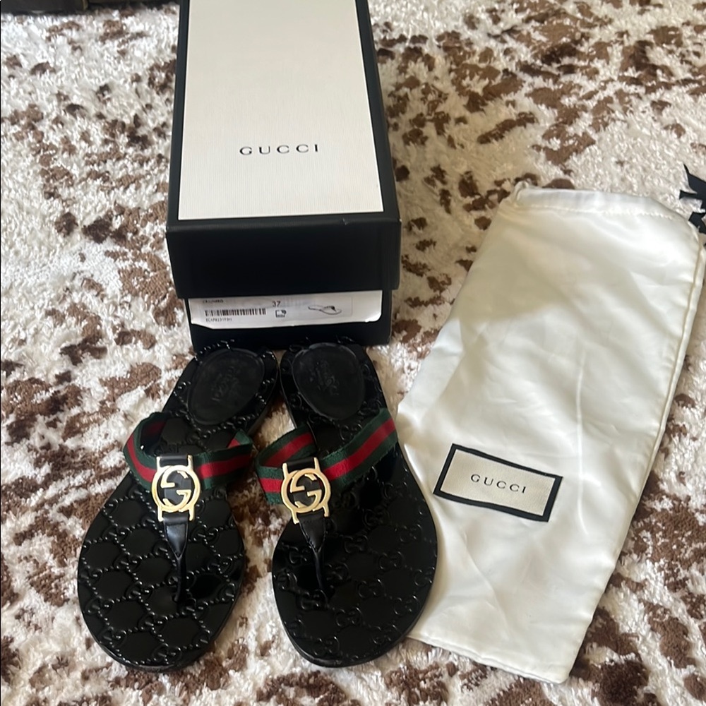 Women’s GG Gucci Black Flip Flops with Signature Straps